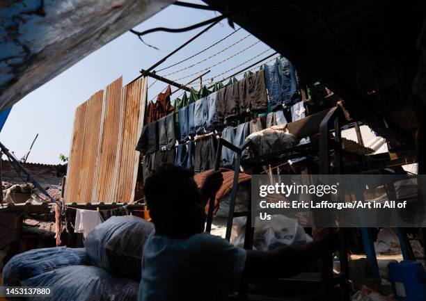 Laundry Worker in Dhobi Ghat, Maharashtra state, Mumbai, India on November 10, 2022 in Mumbai, India.