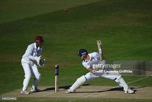 Kevin Pietersen of England scoops the ball over his own head to the boundary during the Second Investec Test match between England and West Indies at...