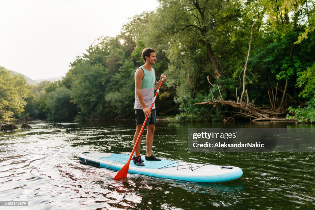 Paddleboarding on the river