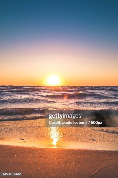 view of the beach in the afternoon,indonesia - sunset fotografías e imágenes de stock