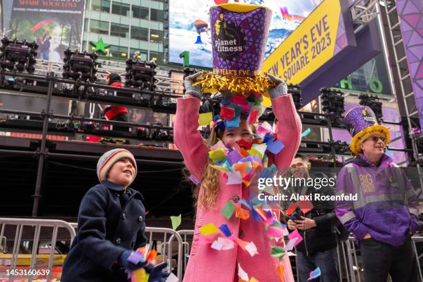 Jonluca Medeiros, eight years-old, and Juliette Medeiros, six years-old, from New Hampshire, play with confetti during the ‘confetti test’ ahead of...