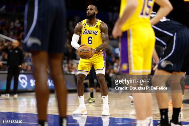 LeBron James of the Los Angeles Lakers looks to shoot a free throw against the Orlando Magic during the third quarter at Amway Center on December 27,...