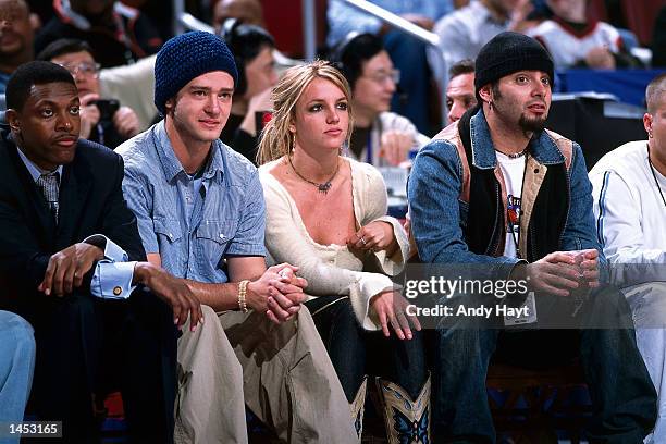 Britney Spears and Justin Timberlake watch the 2002 NBA All Star Game at the First Union Center in Philadelphia, PA. NOTE TO USER: User expressly...