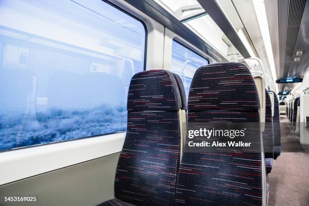 modern passenger train interior, uk - strike back stock pictures, royalty-free photos & images