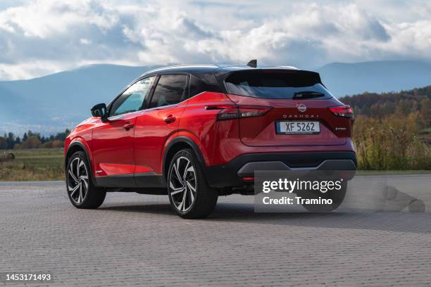 nissan qashqai e-power on a parking - nissan qashqai stock pictures, royalty-free photos & images