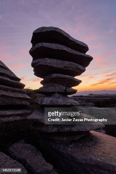 the screw in natural park of torcal of antequera at sunrise - karst formation stockfoto's en -beelden