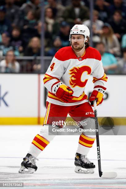Rasmus Andersson of the Calgary Flames skates against the Seattle Kraken during the first period at Climate Pledge Arena on December 28, 2022 in...