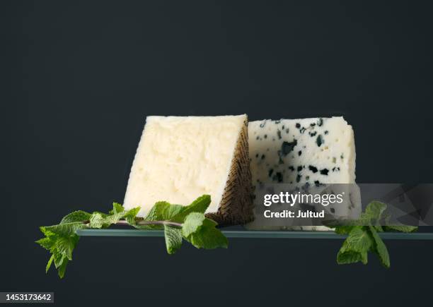 portion of cheese with mint, on glass, with mint leaves - roquefort cheese stock pictures, royalty-free photos & images