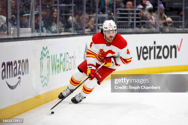 Rasmus Andersson of the Calgary Flames skates against the Seattle Kraken during the second period at Climate Pledge Arena on December 28, 2022 in...