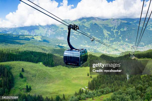 funivia eiger express a grindelwald, svizzera - monte eiger foto e immagini stock