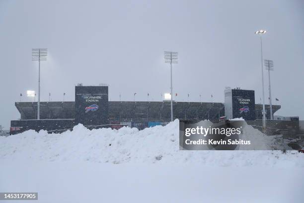 An overall exterior general view of Highmark Stadium in the snow prior to an NFL football game between the Buffalo Bills and the Miami Dolphins at...