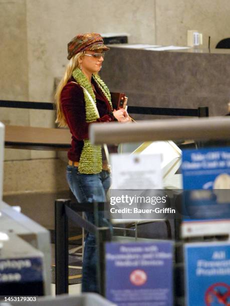 Paris Hilton is seen at Los Angeles International Airport on January 19, 2004 in Los Angeles, California.