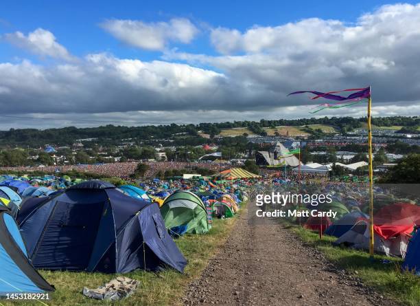 Tents are erected in front of the main Pyramid Stage at the 2017 Glastonbury Festival held at Worthy Farm, in Pilton, Somerset on June 25, 2017 near...