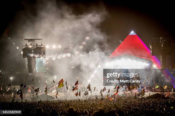 Lights illuminate the crowd in front of the main Pyramid Stage at the 2017 Glastonbury Festival held at Worthy Farm, in Pilton, Somerset on June 24,...