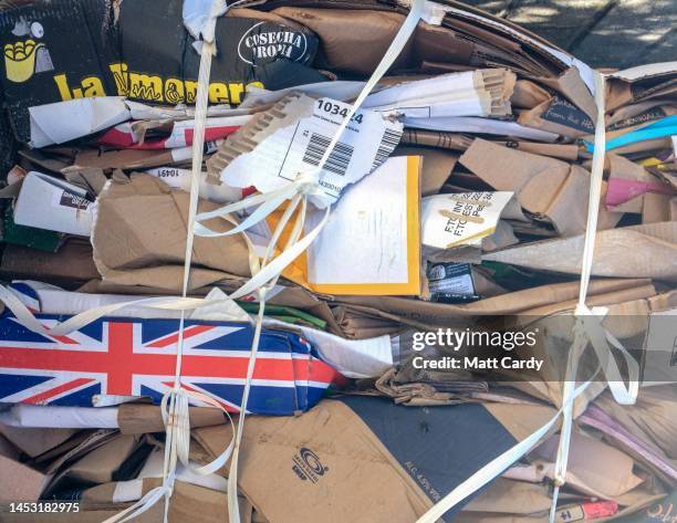 Compacted cardboard boxes and packaging waits to be collected for recycling at Sennen Cove on August 18, 2017 in Cornwall, England. The United...