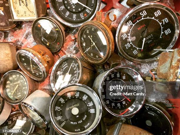 Old car dials and speedometers are displayed for sale on a autojumble stall at a classic car show at the Bath and West Showground near Shepton Mallet...