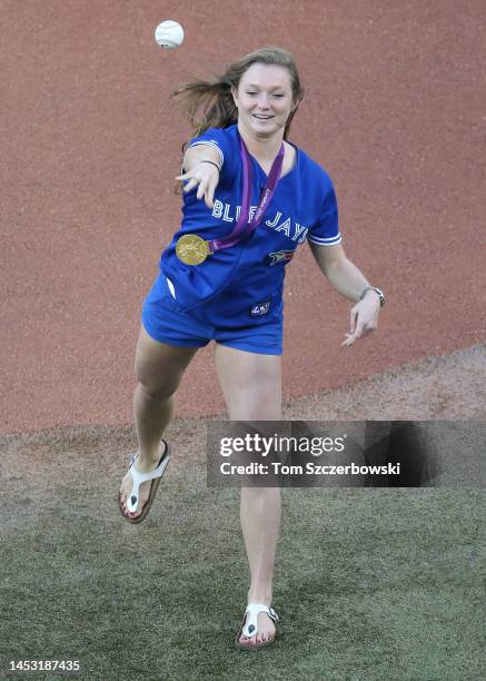 Canada's only gold-medal winner at the London Summer Olympics Rosie MacLennan throws out the opening pitch before MLB game action between the Toronto...