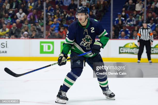 Luke Schenn of the Vancouver Canucks skates up ice during the third period of their NHL game against the San Jose Sharks at Rogers Arena on December...