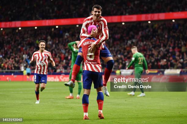 Alvaro Morata of Atletico Madrid celebrates with team mate Antoine Griezmann after scoring their sides second goal during the LaLiga Santander match...