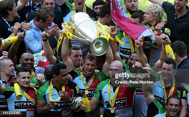 Harlequins captain Chris Robshaw lifts the trophy following his team's victory during the Aviva Premiership final between Harlequins and Leicester...