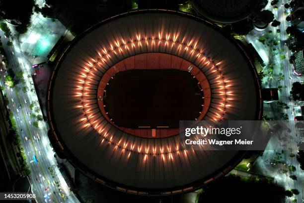 Aerial view of Maracana Stadium lit with golden lights in tribute to late football legend Pelé on December 29, 2022 in Rio de Janeiro, Brazil....