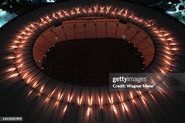 Aerial view of Maracana Stadium lit with golden lights in tribute to late football legend Pelé on December 29, 2022 in Rio de Janeiro, Brazil....