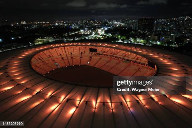 Aerial view of Maracana Stadium lit with golden lights in tribute to late football legend Pelé on December 29, 2022 in Rio de Janeiro, Brazil....