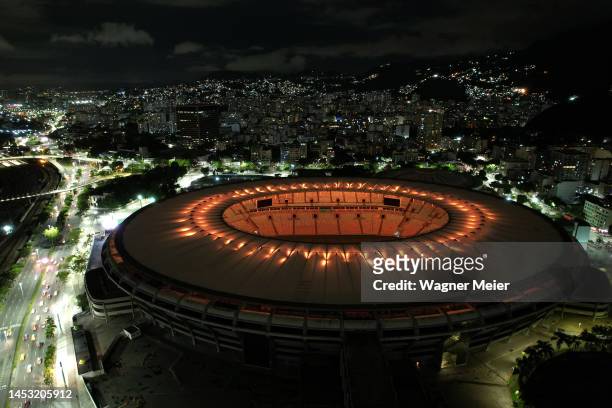 Aerial view of Maracana Stadium lit with golden lights in tribute to late football legend Pelé on December 29, 2022 in Rio de Janeiro, Brazil....