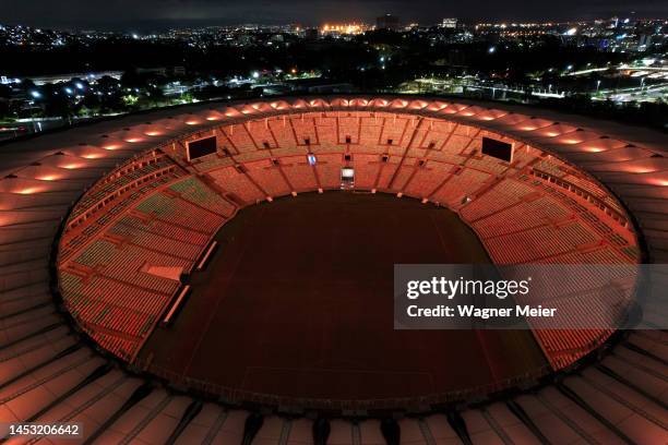 Aerial view of Maracana Stadium lit with golden lights in tribute to late football legend Pelé on December 29, 2022 in Rio de Janeiro, Brazil....