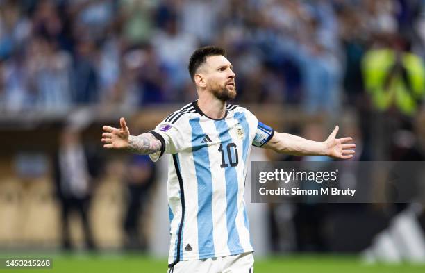 Lionel Messi of Argentina celebrates scoring during the penalty phase of the FIFA World Cup Qatar 2022 Final match between Argentina and France at...