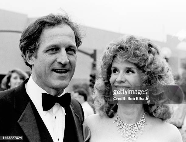 Daniel J. Travanti and Barbara Bosson arrive at the Emmy Awards Show, September 23, 1984 in Pasadena, California.