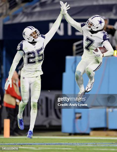 Nahshon Wright of the Dallas Cowboys celebrates with Trevon Diggs after an interception against the Tennessee Titans during the fourth quarter of the...