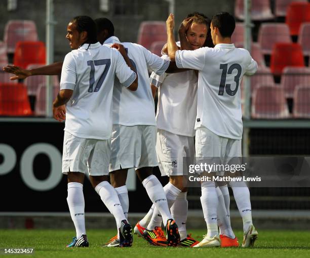 Valere German of France is congratulated on his goal during the Toulon Tournament Group B match between France and Mexico at the Stade du Ray on May...