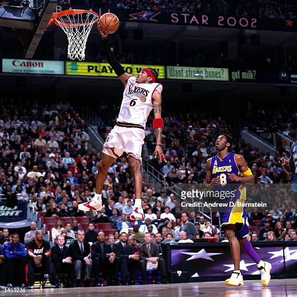 Allen Iverson of the Philadelphia 76''ers drives to the basket for a layup during the 2002 NBA All Star Game at the First Union Center in...