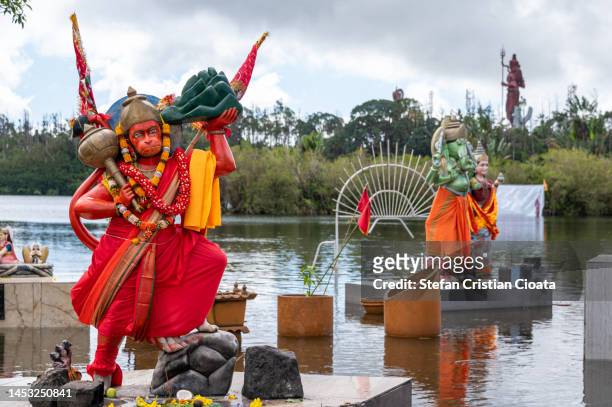 lord hanuman statue at ganga talao lake, mauritius - monkey god stock pictures, royalty-free photos & images