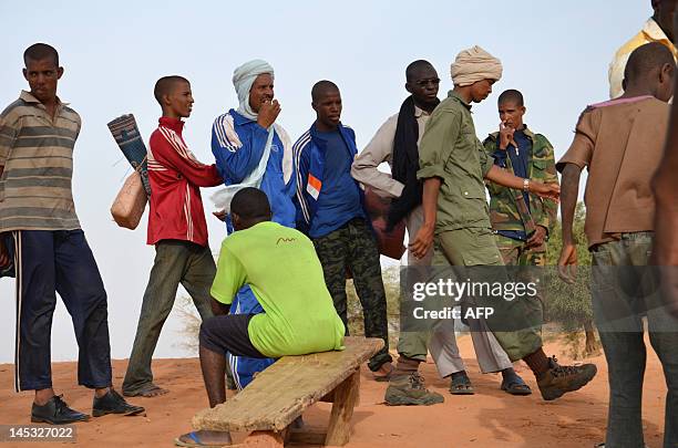 Picture taken on May 25, 2012 shows deserters in a camp near Niamey where have arrived some 500 hundred men who deserted from Mali's army after an...