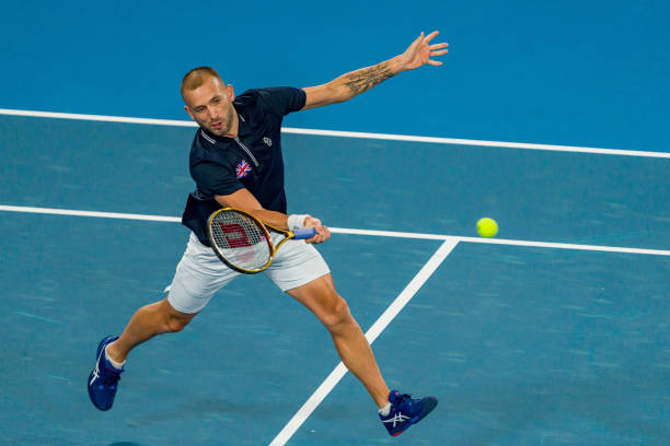 Daniel Evans of Great Britain lunges to play a forehand in the Group D match against Jason Kubler of Australia during day two of the 2023 United Cup...