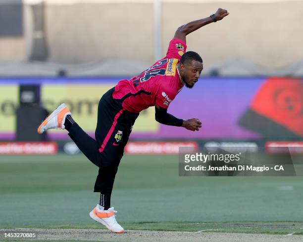 Chris Jordan of the Sixers bowls during the Men's Big Bash League match between the Melbourne Renegades and the Sydney Sixers at GMHBA Stadium, on...