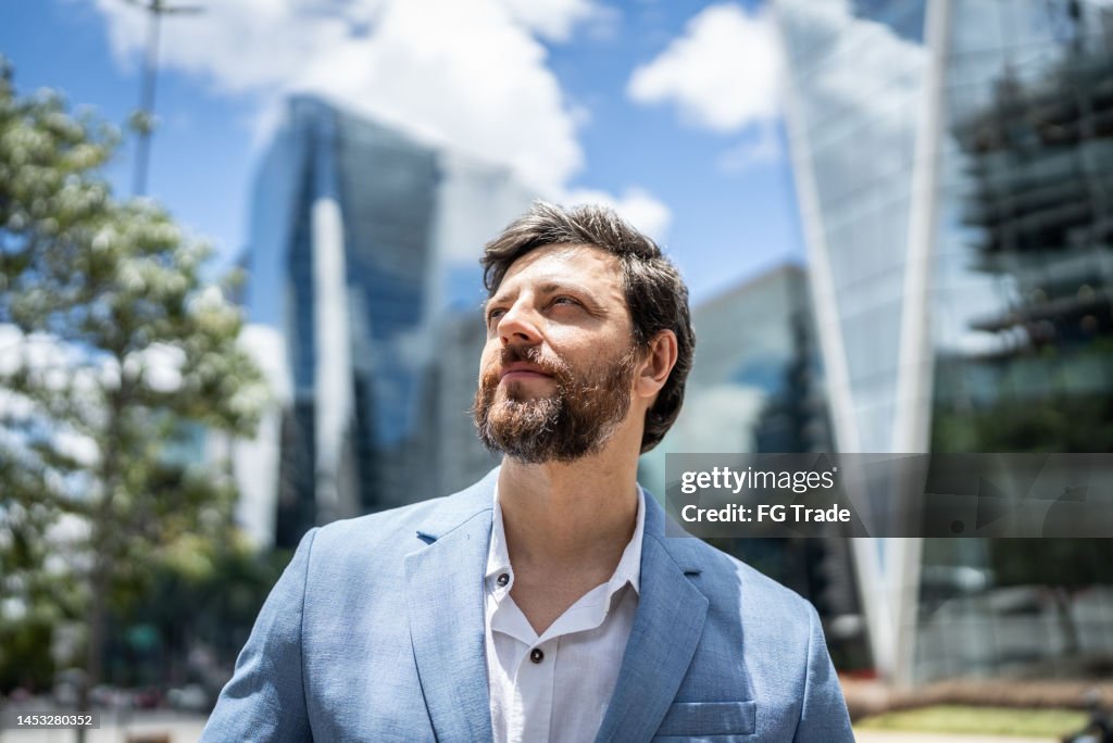 Businessman contemplating in a financial district