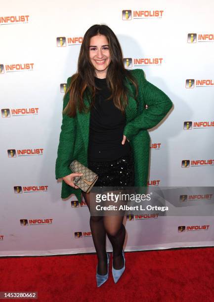 Mikaela Phillips attends Infolist Holiday Extravaganza held at Skybar on December 15, 2022 in West Hollywood, California.