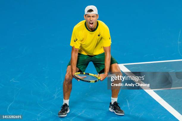 Jason Kubler of Australia celebrates winning match point in the Group D match against Daniel Evans of Great Britain during day two of the 2023 United...