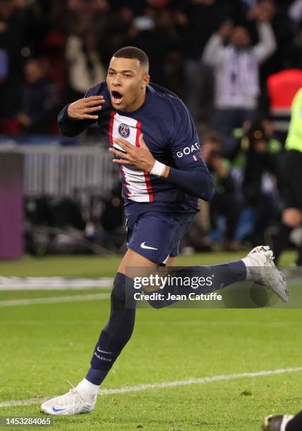 Kylian Mbappe of PSG celebrates his winning goal at 2-1 on a penalty kick during the Ligue 1 match between Paris Saint-Germain and RC Strasbourg...