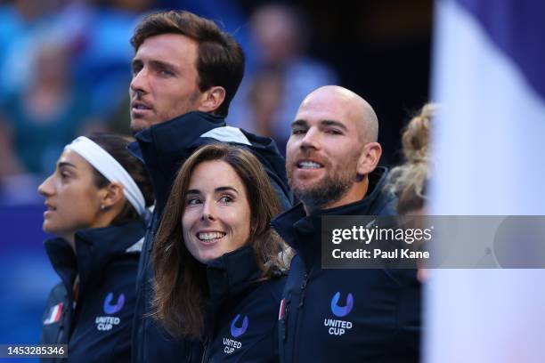 Alize Cornet of France looks on after the playing of the national anthems during day two of the 2023 United Cup at RAC Arena on December 30, 2022 in...