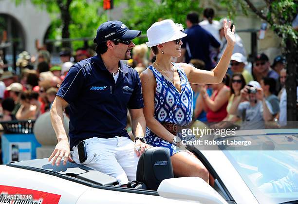 Alex Tagliani of Canada driver of the Bryan Herta Autosport w/Curb Agajanian Dallara Honda with his wife Bronte during the Indianapolis 500 Festival...