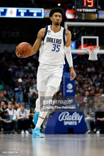 Christian Wood of the Dallas Mavericks brings the ball up court against the Houston Rockets in the second half at American Airlines Center on...