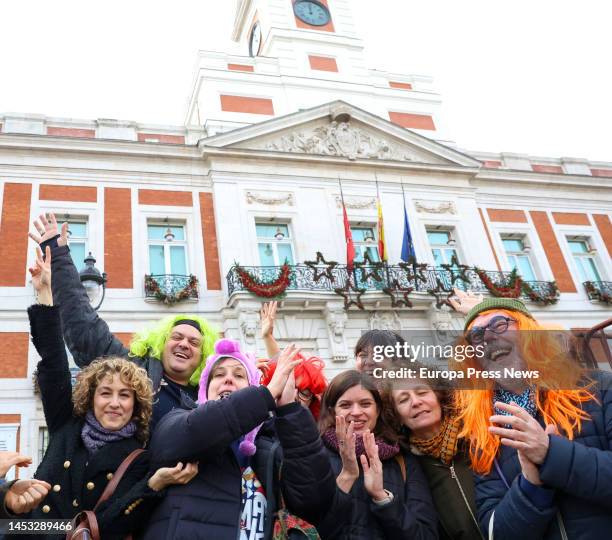 Several people celebrate in costume during the Preuvas at Puerta del Sol on December 30, 2022 in Madrid, Spain. The Preuvas is a rehearsal for the 12...