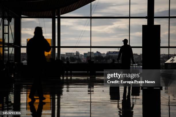 Travelers at Terminal 4 of Adolfo Suarez Madrid-Barajas airport, on 30 December, 2022 in Madrid, Spain. Aena's airport network expects to operate a...