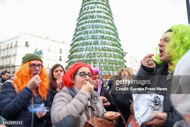 Several people take the Preuvas at Puerta del Sol, on 30 December, 2022 in Madrid, Spain. The Preuvas is a rehearsal for the 12 New Year's Eve chimes...