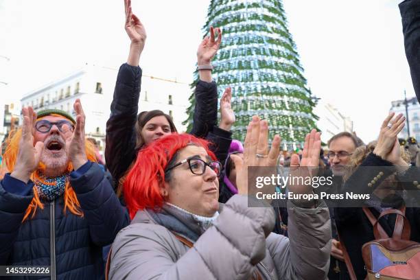 Several people celebrate the Preuvas at Puerta del Sol on December 30, 2022 in Madrid, Spain. The Preuvas is a rehearsal for the 12 New Year's Eve...