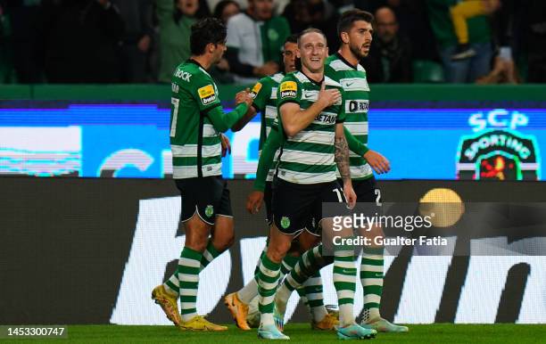 Nuno Santos of Sporting CP celebrates with teammates after scoring a goal during the Liga Bwin match between Sporting CP and Pacos de Ferreira at...